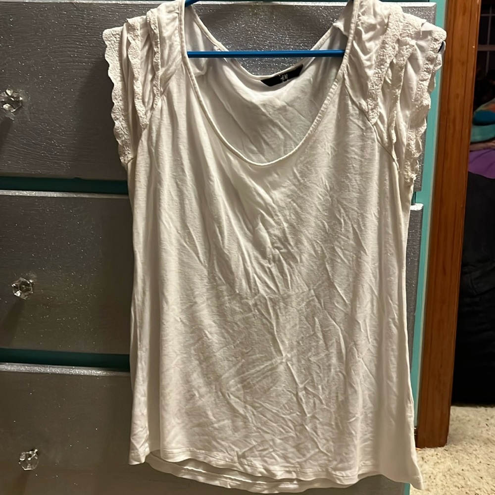 White ruffled top